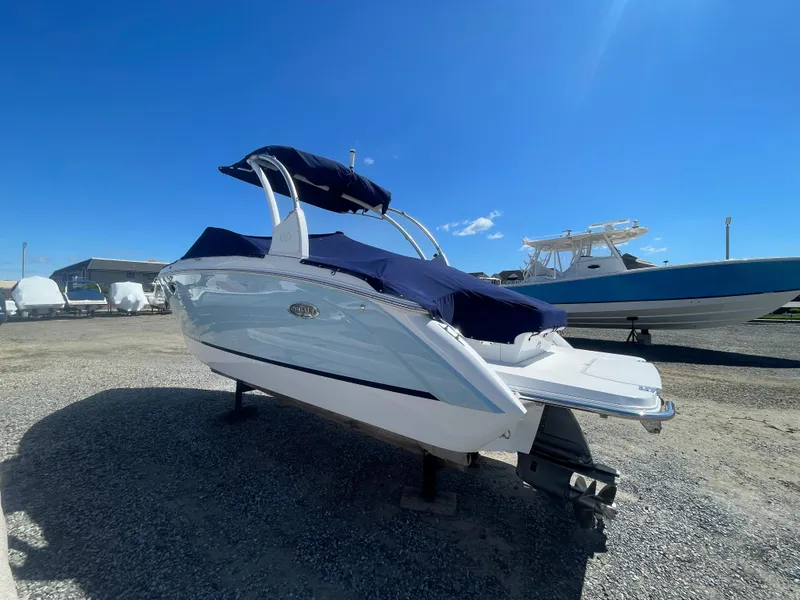Slide: The Image of 2016 Cobalt R5 boat with blue cover on a sunny day. - 6