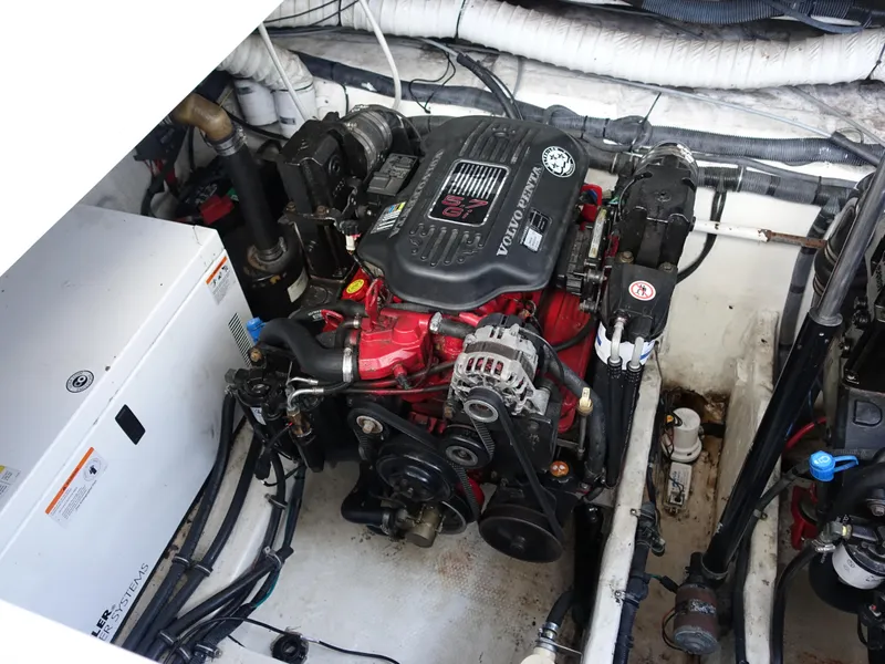 Slide: The Image of Engine compartment of a 2008 Rinker 330 Express Cruiser with Volvo Penta engine. - 26