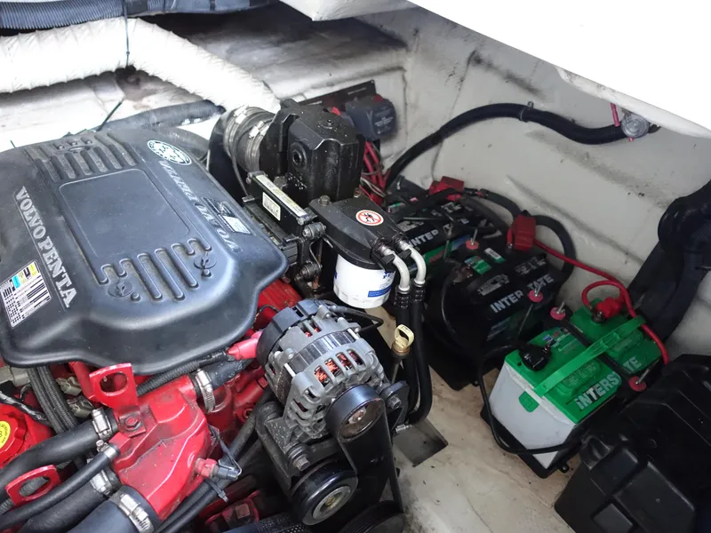 Slide: The Image of Engine compartment of a 2008 Rinker 330 Express Cruiser with Volvo Penta components. - 29