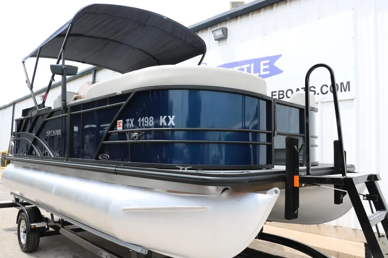 Slide: The Image of 2023 Sylvan Mirage Fish 820 Party Fish pontoon boat with canopy on trailer. - 10