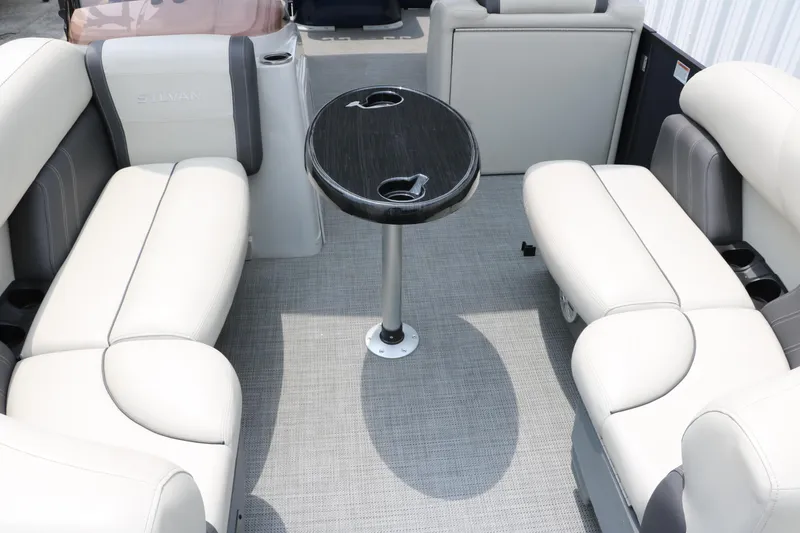 Slide: The Image of 2023 Sylvan Mirage Fish 820 Party Fish interior with seating and table. - 14