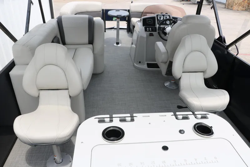 Slide: The Image of Interior of 2023 Sylvan Mirage Fish 820 Party Fish boat with plush seating and modern dashboard. - 17
