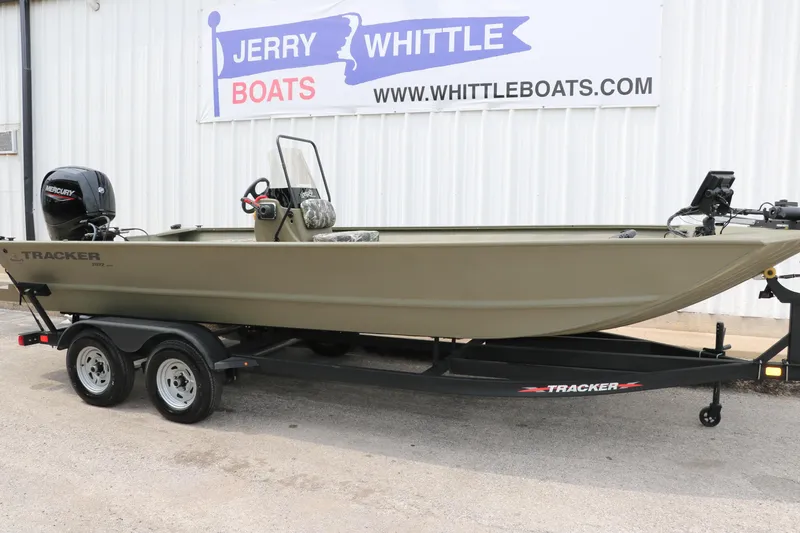 Slide: The Image of 2024 Tracker Grizzly 2072 MVX boat on trailer at Jerry Whittle Boats dealership. - 5