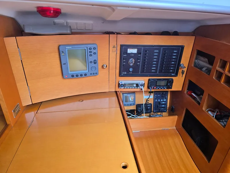 Slide: The Image of Control panel of a 2000 Beneteau First 40.7 sailboat with navigation equipment. - 19