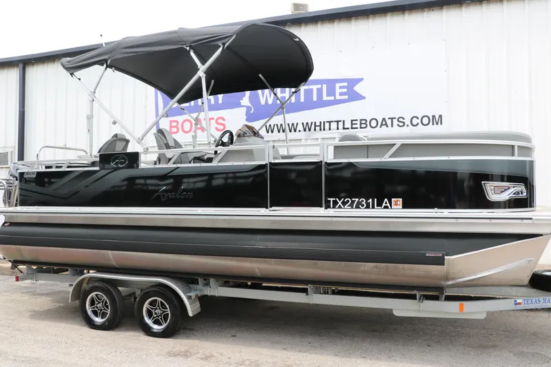 Slide: The Image of 2023 Avalon Venture 2385 RF pontoon boat on trailer at Whittle Boats dealership. - 28