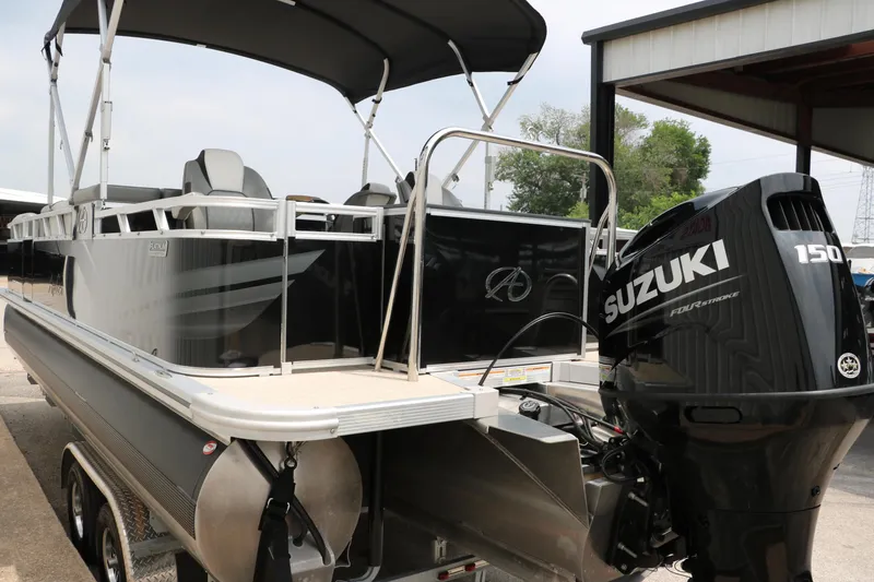 Slide: The Image of 2023 Avalon Venture 2385 RF pontoon boat with Suzuki 150 outboard motor. - 6