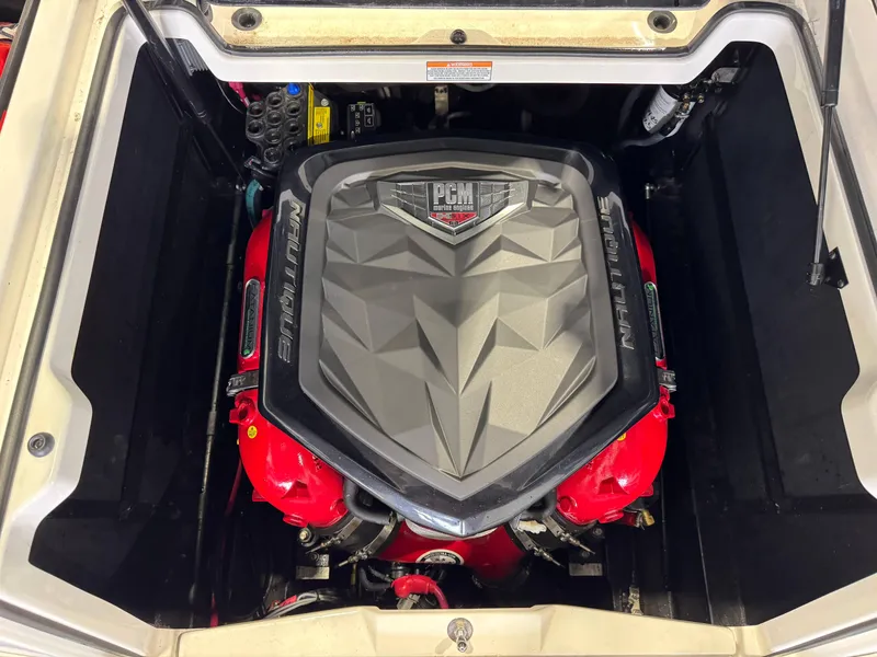 Slide: The Image of 2019 Nautique Super Air Nautique G25 engine compartment with PCM engine cover. - 28