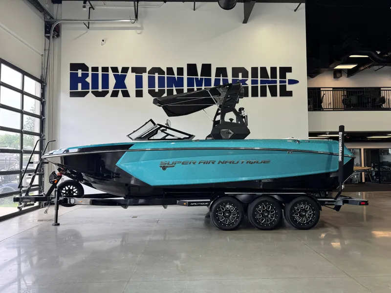 Slide: The Image of 2019 Nautique Super Air Nautique G25 boat displayed at Buxton Marine showroom. - 4