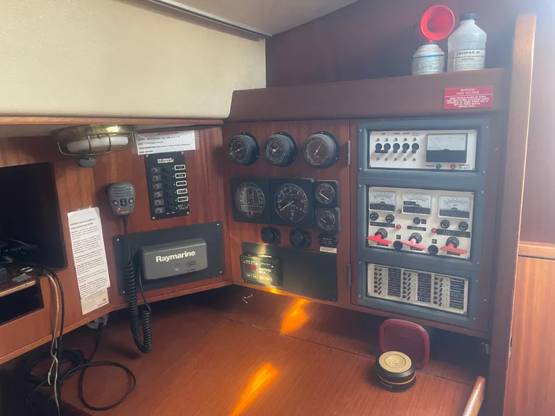 Slide: The Image of Control panel of a 1984 Hanseat 37 sailboat with navigation instruments and gauges. - 23
