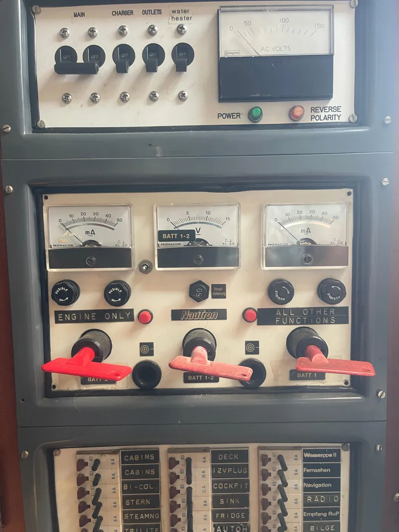 Slide: The Image of Control panel of a 1984 Hanseat 37 boat with gauges and switches. - 26