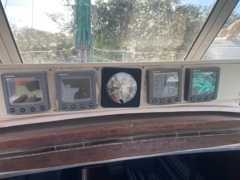 Slide: The Image of Control panel of a 1984 Hanseat 37 sailboat with navigation instruments. - 32