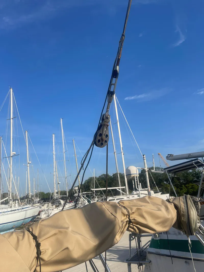 Slide: The Image of Sailboat rigging on a 1984 Hanseat 37 under a clear blue sky. - 5