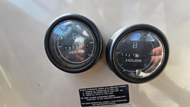 Slide: The Image of Hour meters on a 1995 Regal Commodore 292 boat dashboard. - 27