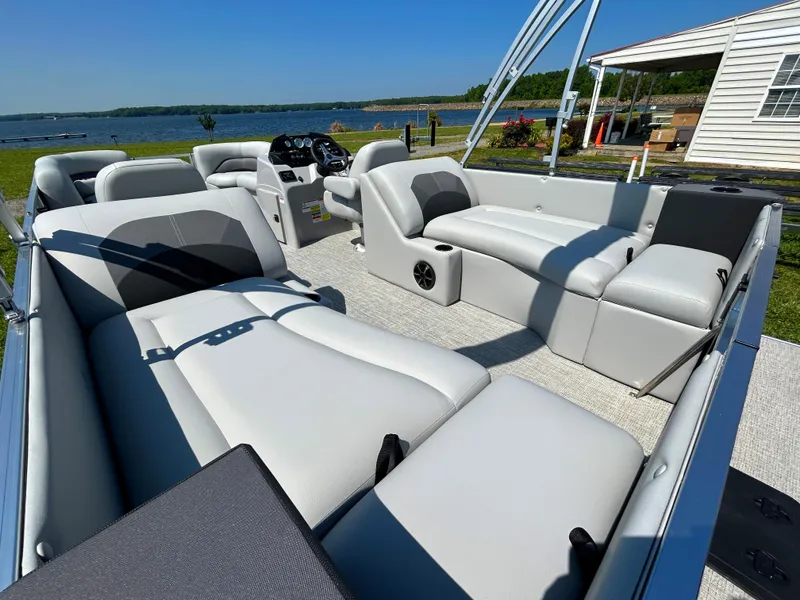Slide: The Image of 2023 Landau Island Breeze 232 Cruise pontoon boat with spacious seating and modern design. - 6