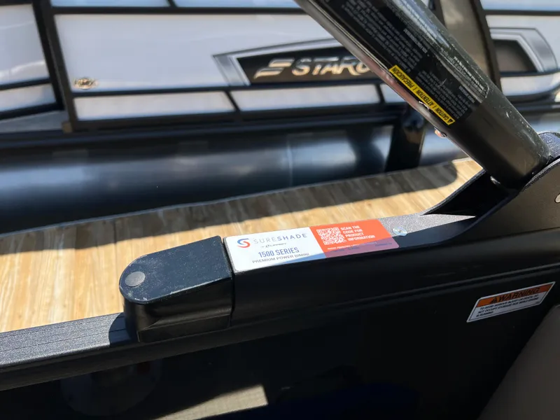 Slide: The Image of 2025 Starcraft EXS 3 Q DH boat with Sureshade sunshade system. - 15