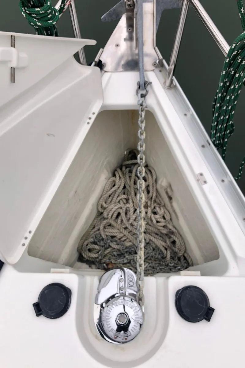 Slide: The Image of Anchor locker of 2001 Beneteau 361 sailboat with chain and rope. - 17