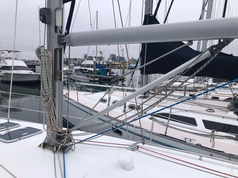 Slide: The Image of Beneteau 361 sailboat deck with rigging, docked in a marina, 2001 model. - 21