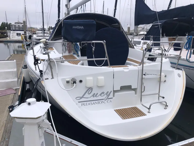 Slide: The Image of 2001 Beneteau 361 sailboat docked, named "Lucy," in Pleasanton, CA marina. - 26