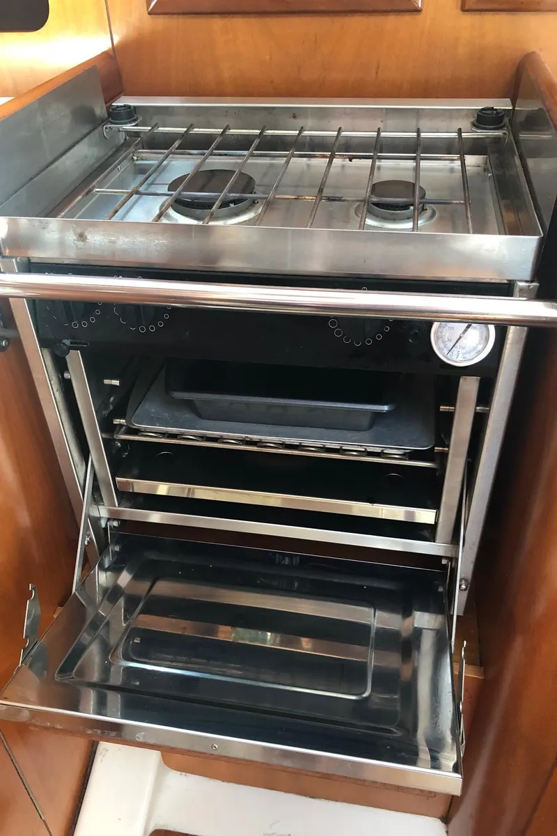 Slide: The Image of Stainless steel stove and oven in 2001 Beneteau 361 yacht kitchen. - 9