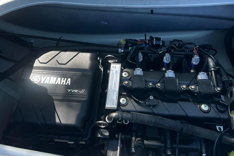 Slide: The Image of 2021 Yamaha WaveRunner VX engine compartment with TR-1 engine components visible. - 14