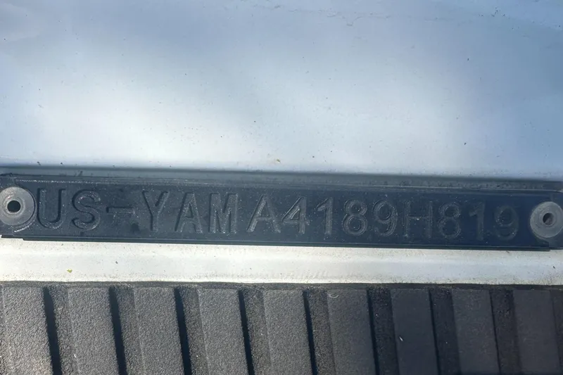 Slide: The Image of Yamaha WaveRunner VX 2021 hull identification number on black and white surface. - 18