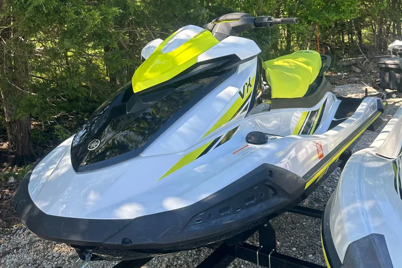 Slide: The Image of 2021 Yamaha WaveRunner VX in white and yellow, parked outdoors on a trailer. - 3