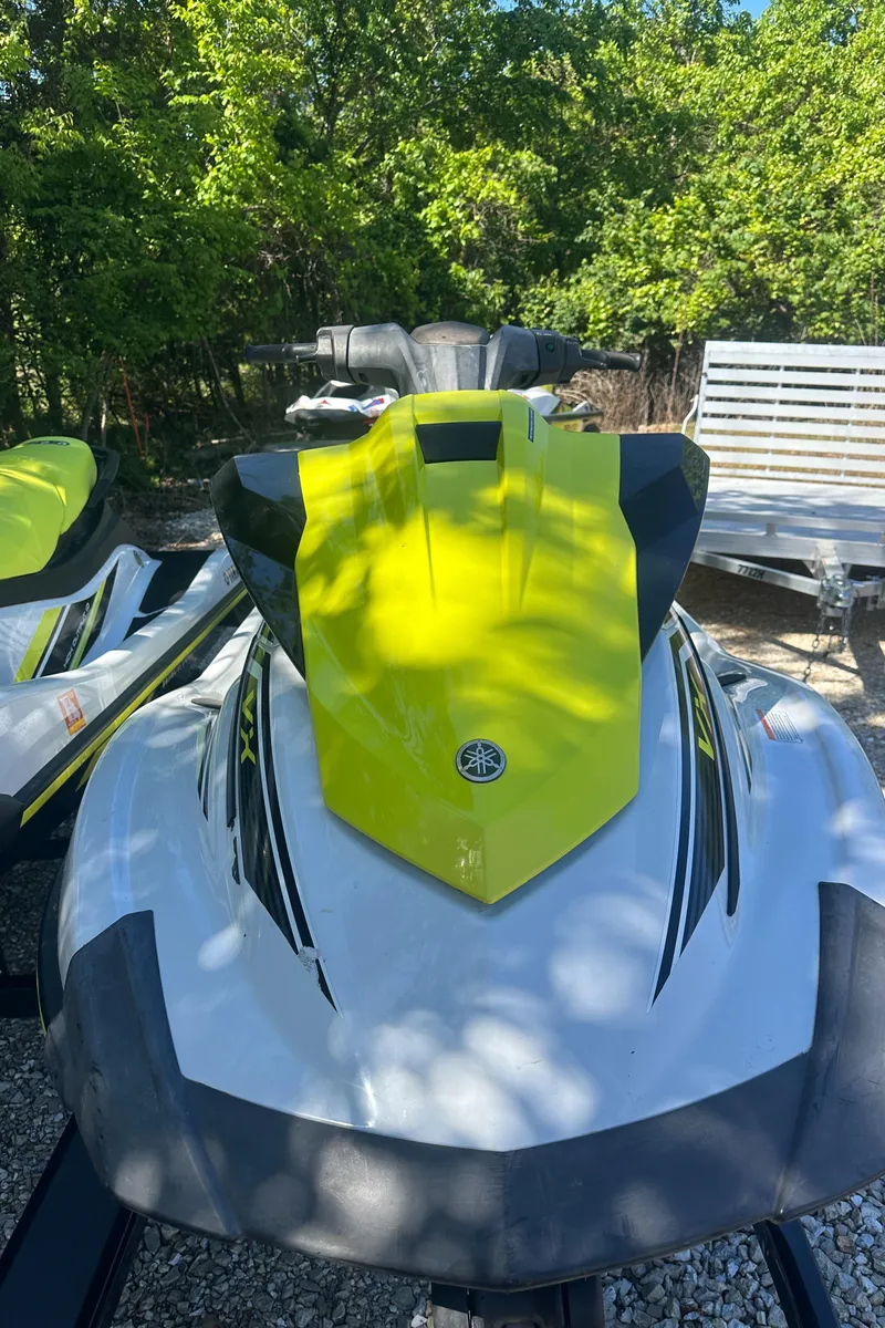 Slide: The Image of 2021 Yamaha WaveRunner VX in vibrant yellow and black, parked outdoors. - 5