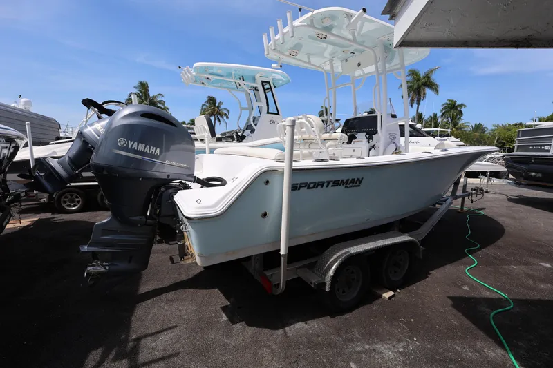Slide: The Image of 2020 Sportsman Heritage 211 Center Console boat on trailer with Yamaha engine. - 20