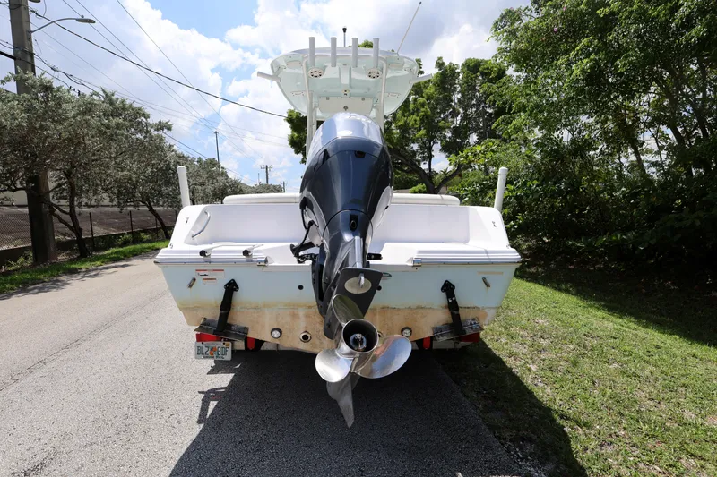 Slide: The Image of 2020 Sportsman Heritage 211 Center Console boat on trailer, rear view. - 22