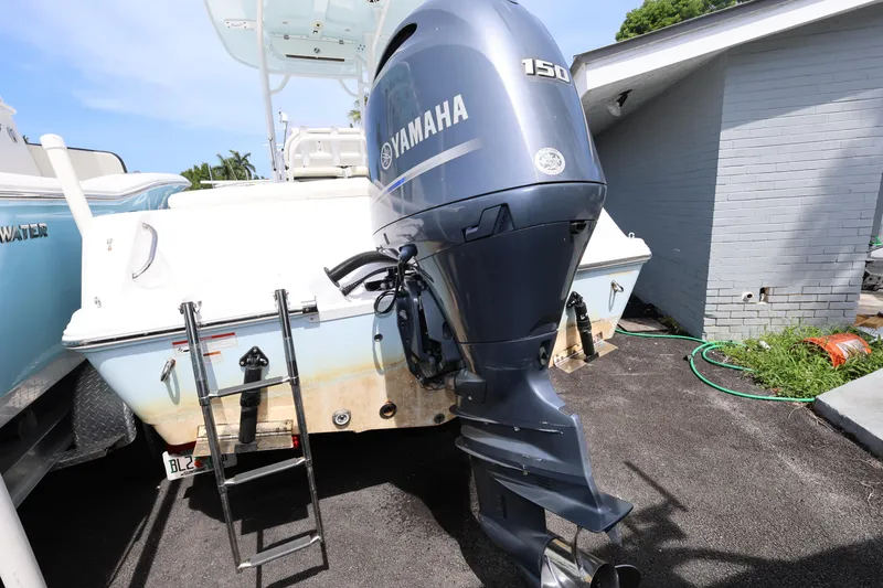 Slide: The Image of 2020 Sportsman Heritage 211 Center Console with Yamaha 150 outboard motor. - 23