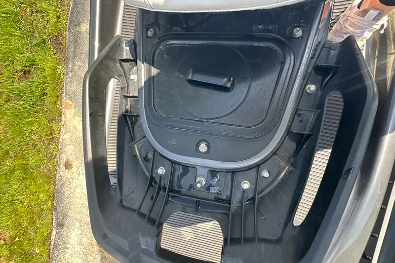 Slide: The Image of 2019 Yamaha WaveRunner VX Cruiser HO storage compartment, open lid, on a sunny day. - 19