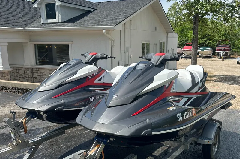 Slide: The Image of Two 2019 Yamaha WaveRunner VX Cruiser HO jet skis on trailers outside a building. - 5