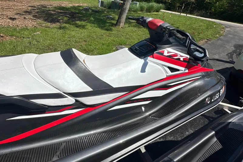 Slide: The Image of 2019 Yamaha WaveRunner VX Cruiser HO in red and white on a trailer. - 9