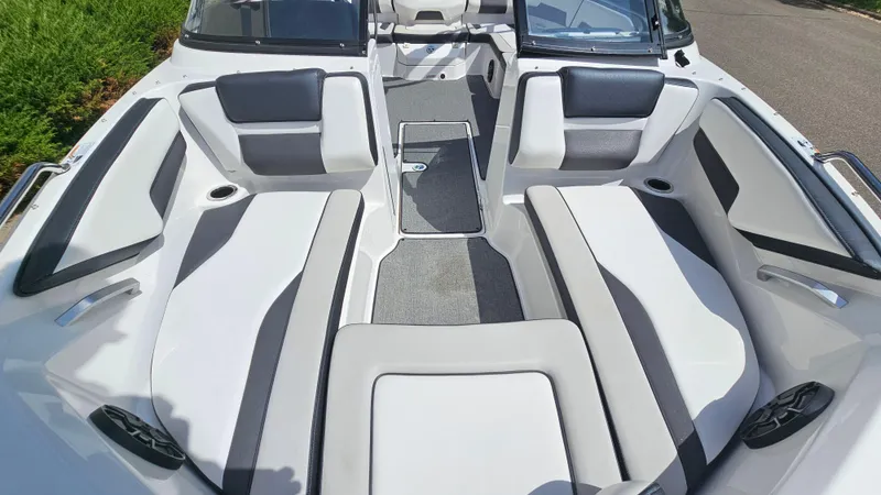 Slide: The Image of 2019 Yamaha Boats AR195 interior with spacious seating and modern design. - 16