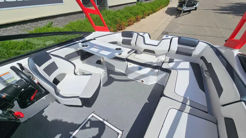 Slide: The Image of 2019 Yamaha Boats AR195 interior with modern seating and sleek design. - 17