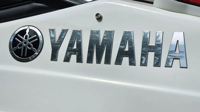 Slide: The Image of 2019 Yamaha Boats AR195 logo on white surface. - 24