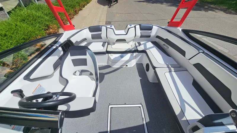 Slide: The Image of 2019 Yamaha Boats AR195 interior with sleek seating and modern design. - 7