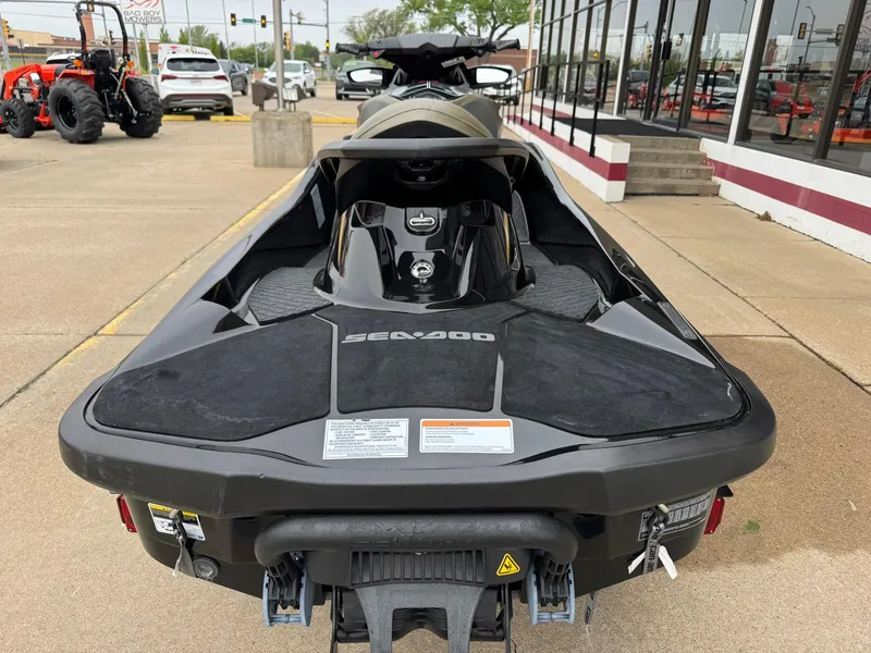 Slide: The Image of 2017 Sea-Doo GTX155 jet ski, black, parked outside a dealership. - 9