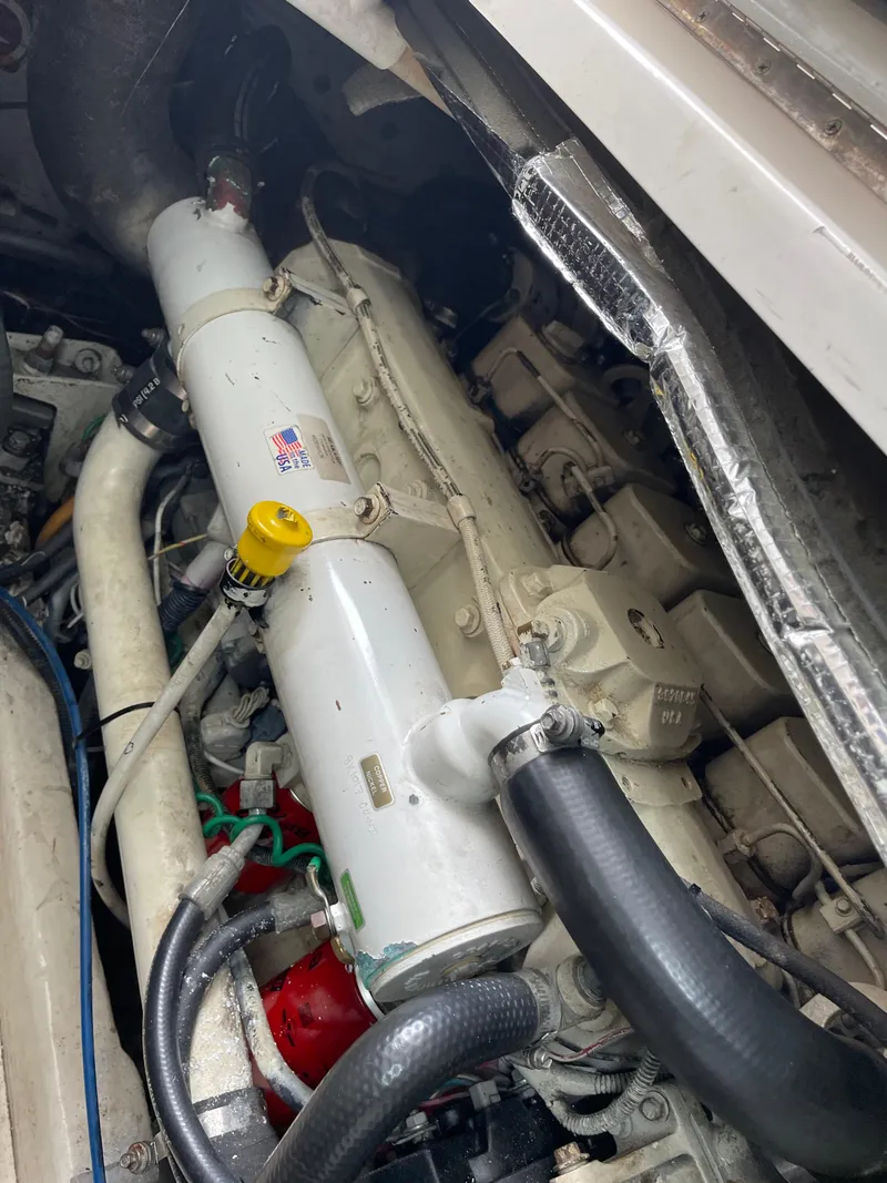 Slide: The Image of Engine compartment of a 2003 Tiara Yachts 3500 Open, showcasing mechanical components. - 25