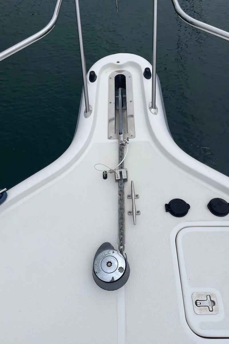 Slide: The Image of 2003 Tiara Yachts 3500 Open bow with anchor chain and deck fittings. - 26