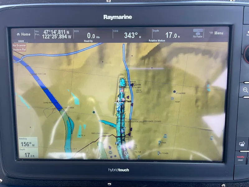 Slide: The Image of Raymarine navigation display on 2003 Tiara Yachts 3500 Open, showing map and coordinates. - 42