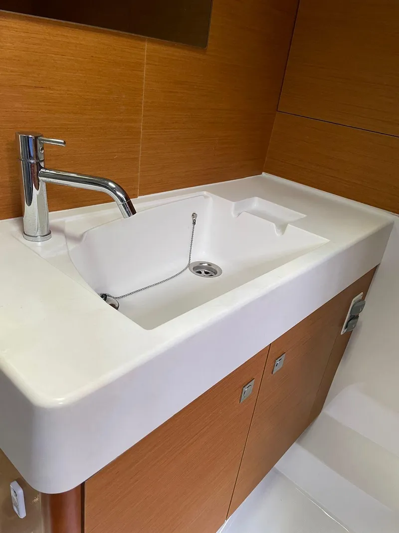 Slide: The Image of Modern sink in 2017 Jeanneau Sun Odyssey 479 yacht bathroom. - 18