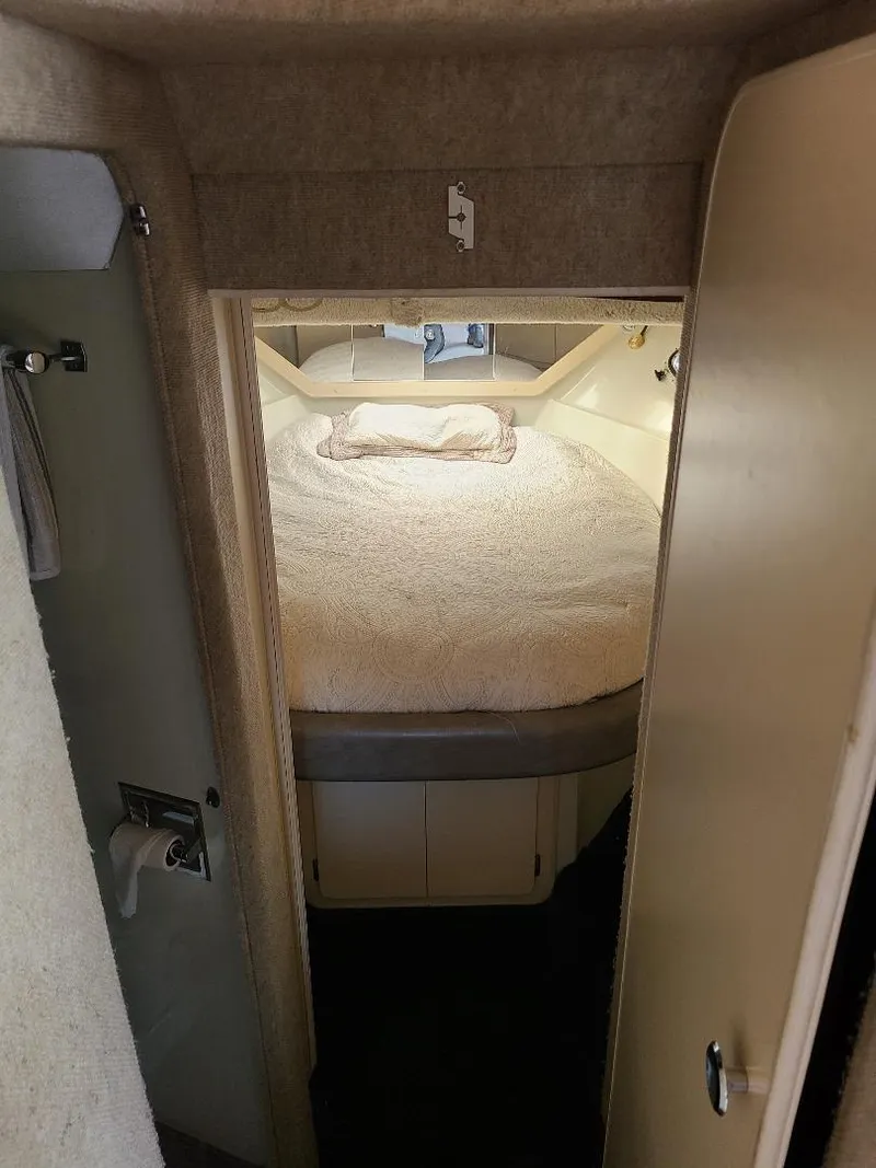 Slide: The Image of Cozy bedroom in 1989 Bluewater Yachts Coastal Cruiser 42, featuring a comfortable bed. - 10