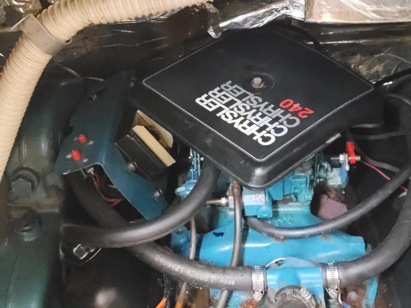 Slide: The Image of Engine compartment of a 1989 Bluewater Yachts Coastal Cruiser 42 with Chrysler 240 engine. - 21
