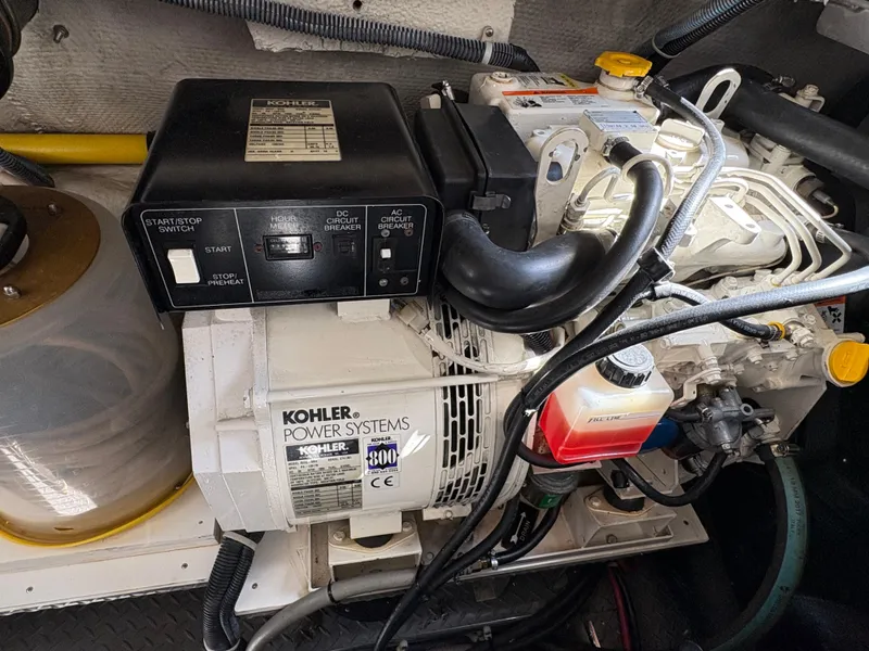 Slide: The Image of Engine room of 2003 Regal 4260 Express Cruiser with Kohler power system. - 10