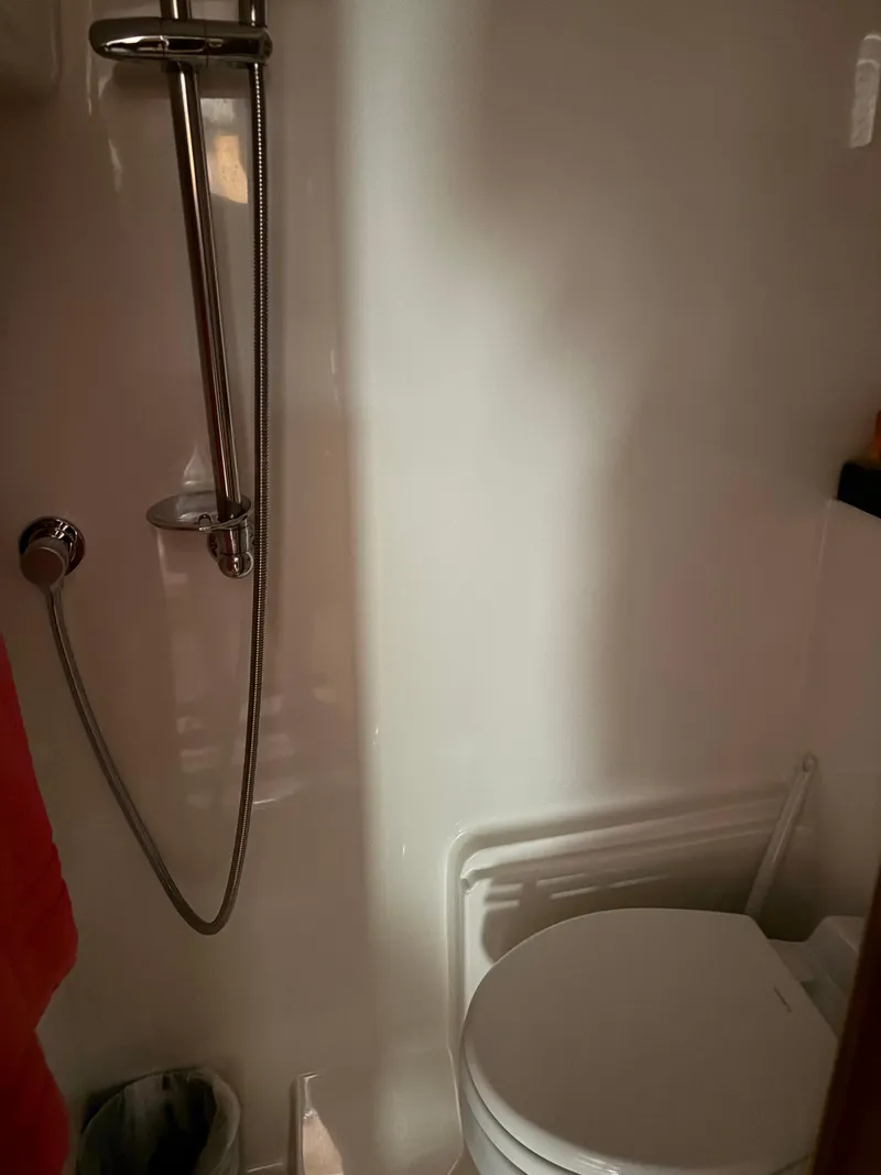 Slide: The Image of Bathroom interior of 2003 Regal 4260 Express Cruiser with shower and toilet. - 28