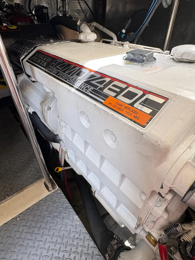 Slide: The Image of Engine of 2003 Regal 4260 Express Cruiser, featuring Volvo Penta 74EDC. - 4