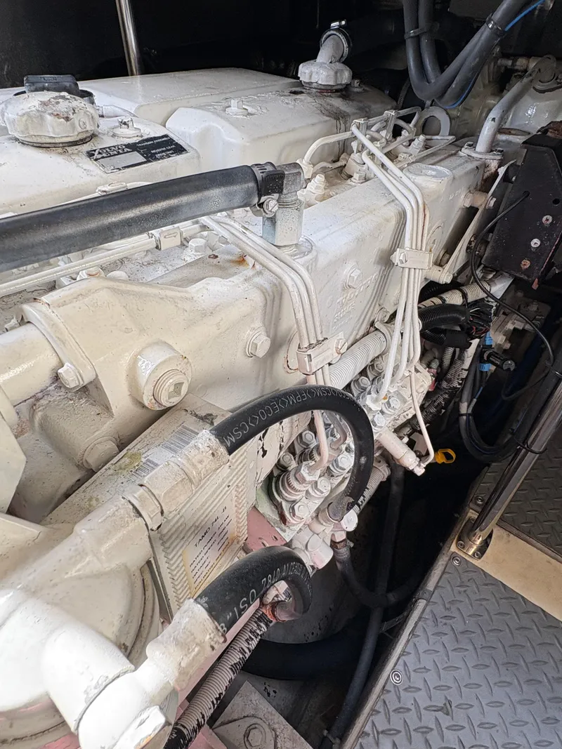 Slide: The Image of Engine of 2003 Regal 4260 Express Cruiser, showcasing intricate mechanical components. - 5