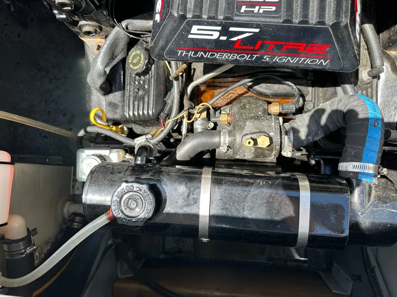 Slide: The Image of Engine of 1998 Sea Ray 240 Sundancer with 5.7L Thunderbolt ignition system. - 21