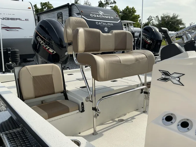 Slide: The Image of 2025 Xpress Hyper-Lift Series H22B boat interior with seating and engine details. - 4